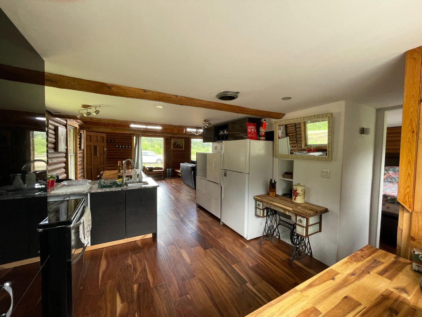 The open kitchen and island looking through to the living room